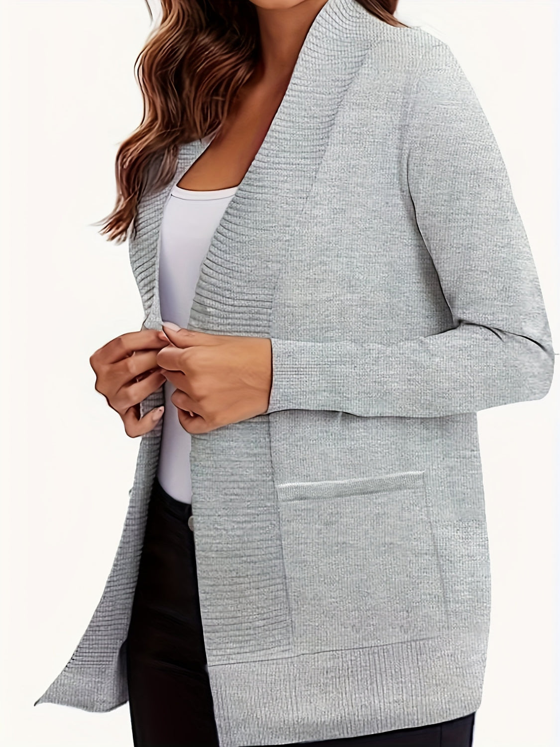 Open front long sleeve sweater cardigan with pockets.