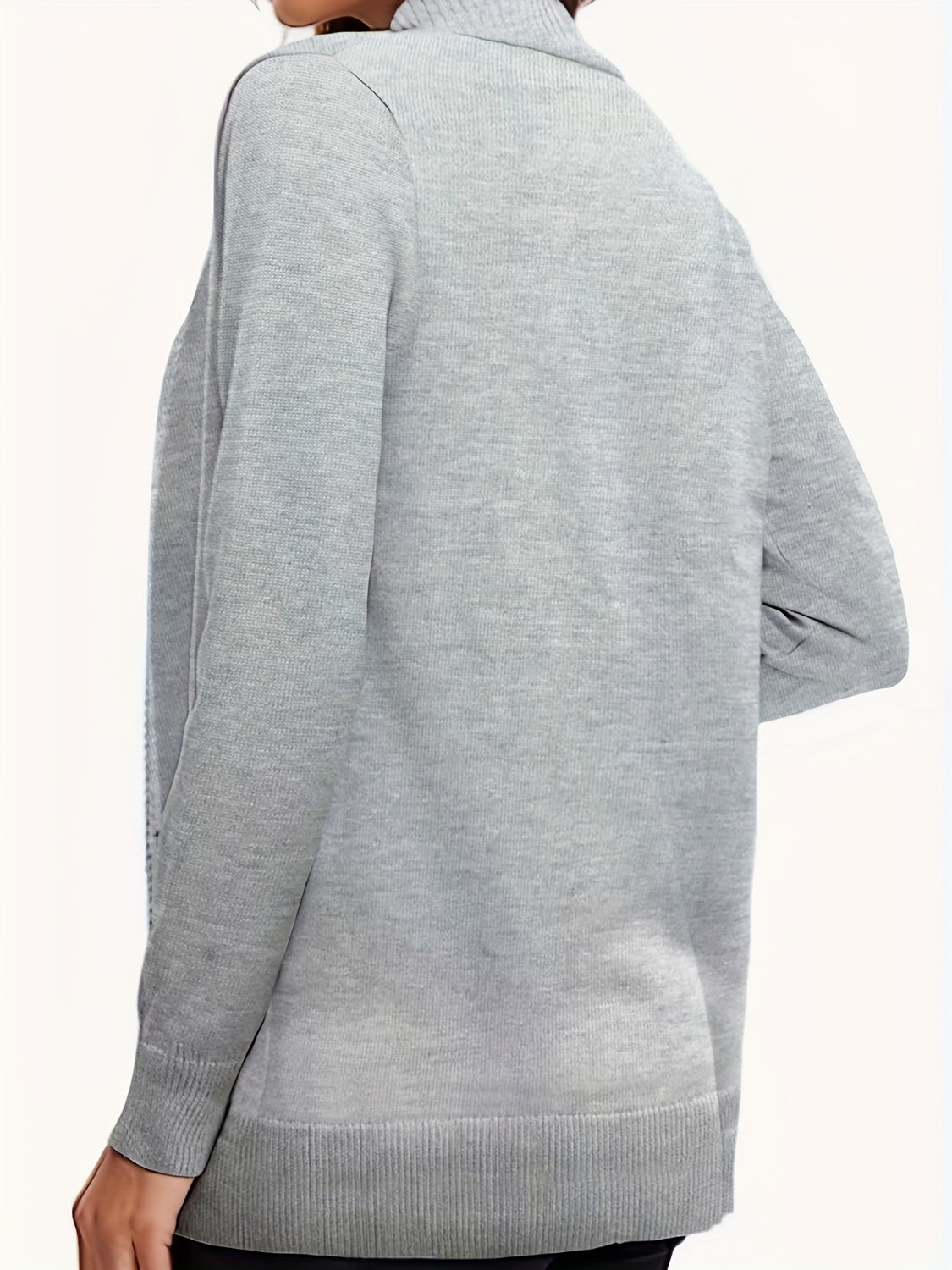 Open front long sleeve sweater cardigan with pockets.