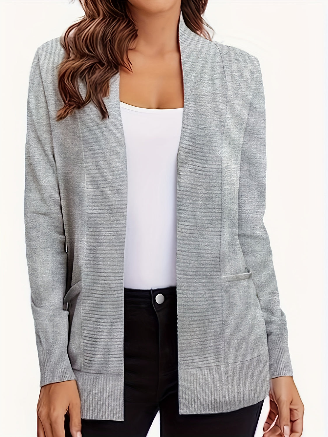 Open front long sleeve sweater cardigan with pockets.