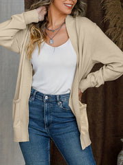 Open front long sleeve sweater cardigan with pockets.