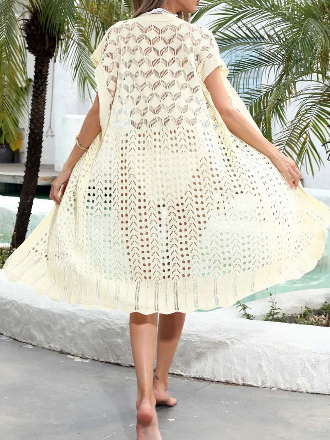 Open Front Short Sleeve Openwork Cover-Up with Ruffled Details.