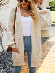Open front sweater cardigan with pockets.