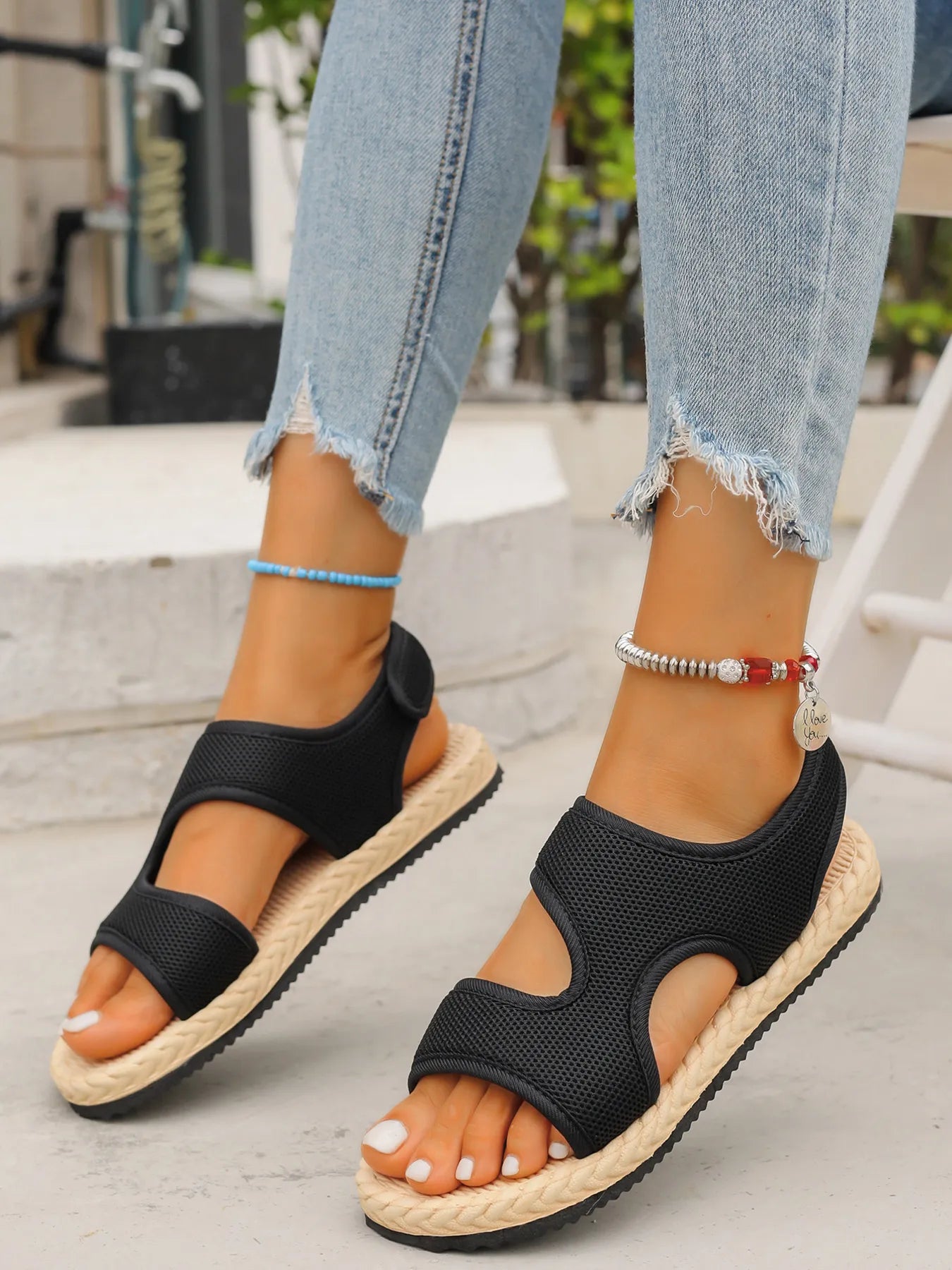 Open toe mesh flat sandals.