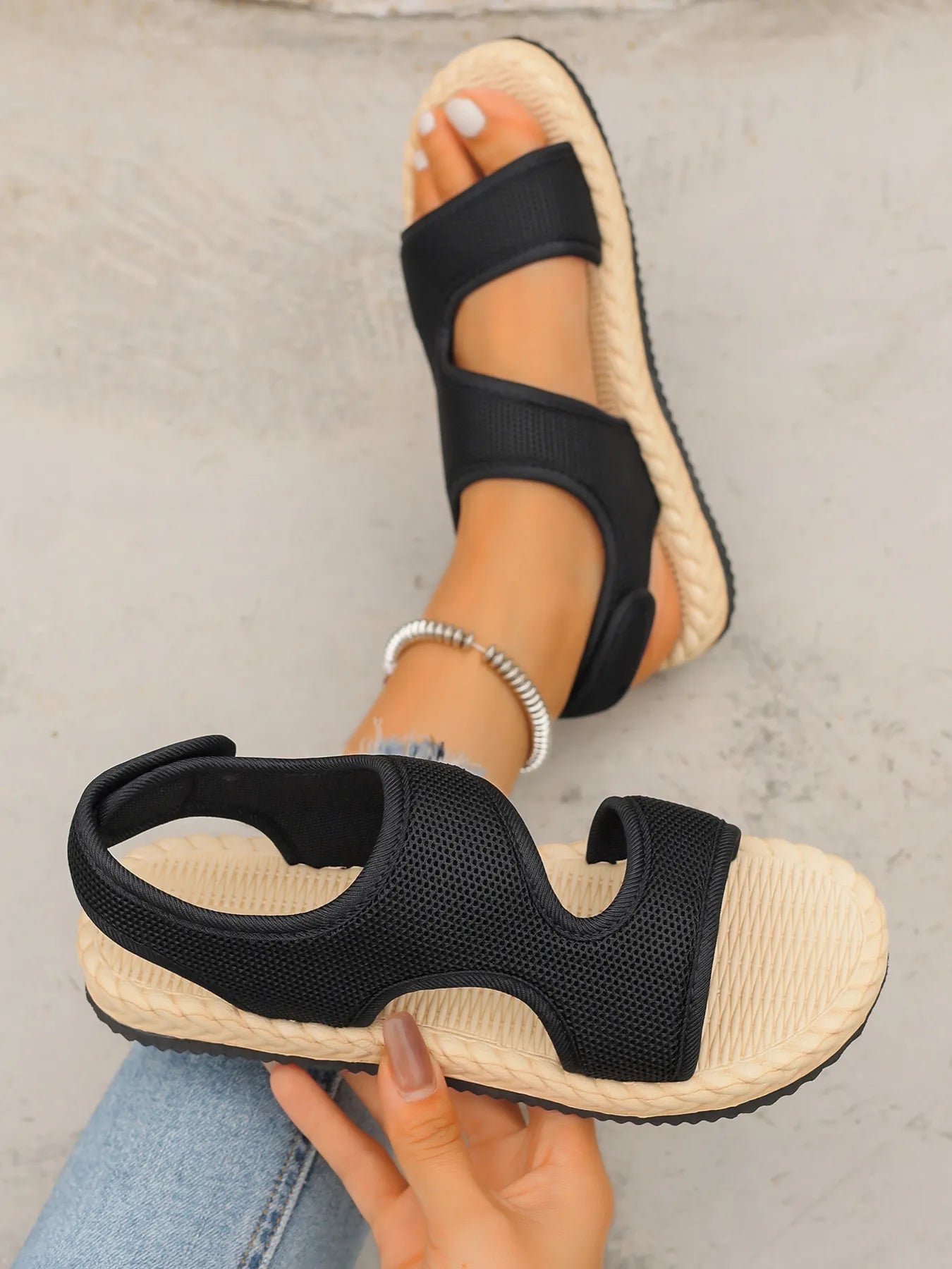 Open toe mesh flat sandals.