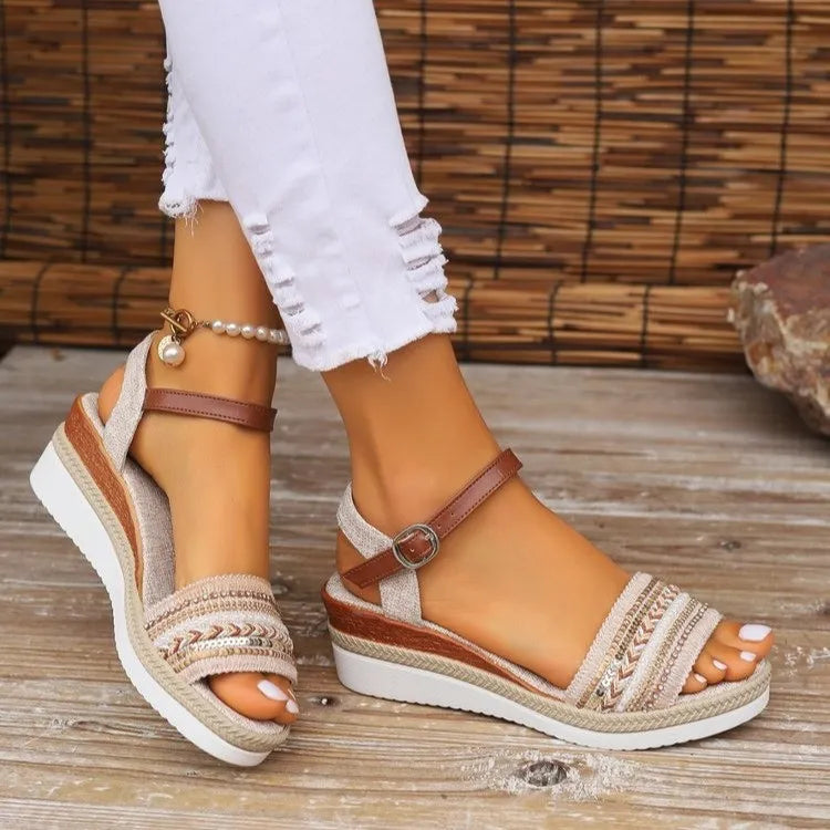 Open toe mid-heel platform wedge sandals.