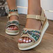 Open toe mid-heel platform wedge sandals.