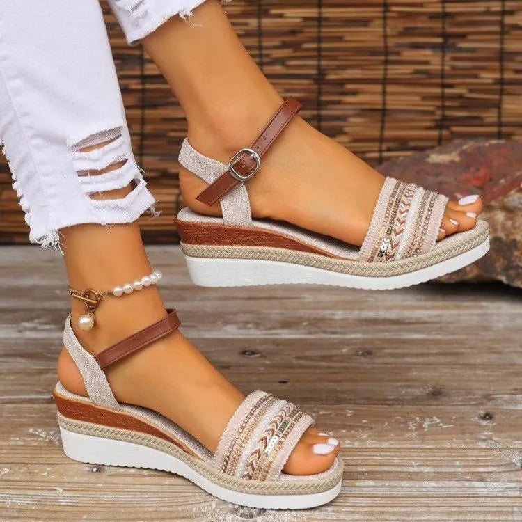 Open toe mid-heel platform wedge sandals.