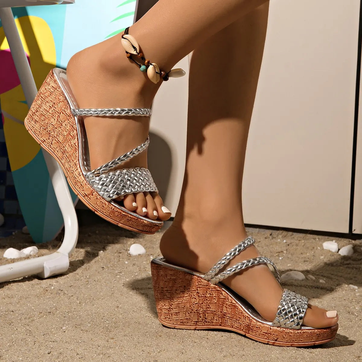 Open toe mid-heel wedge sandals.