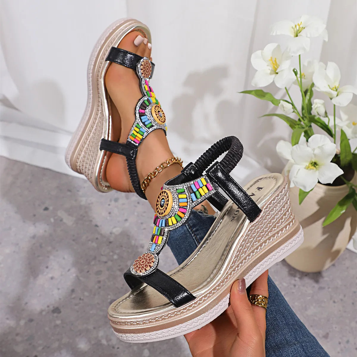 Open toe mid-heel wedge sandals.