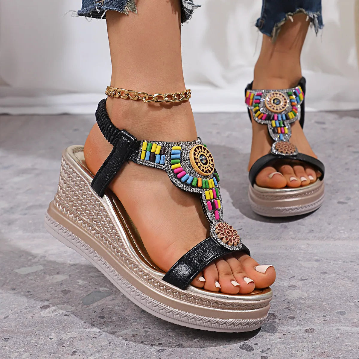 Open toe mid-heel wedge sandals.