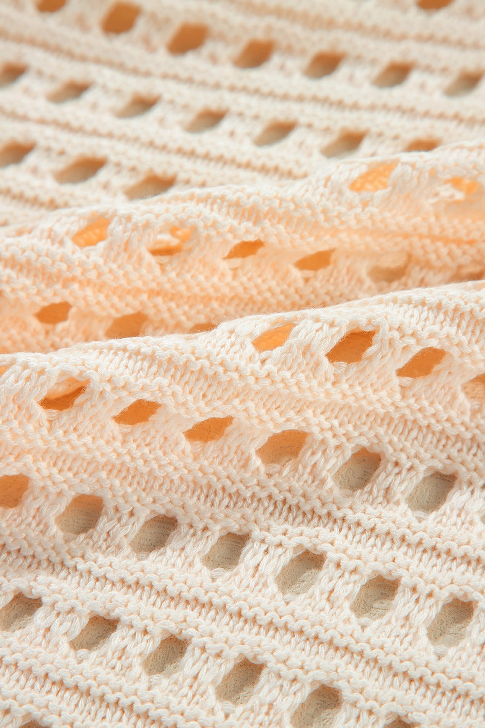 Openwork open front cardigan.