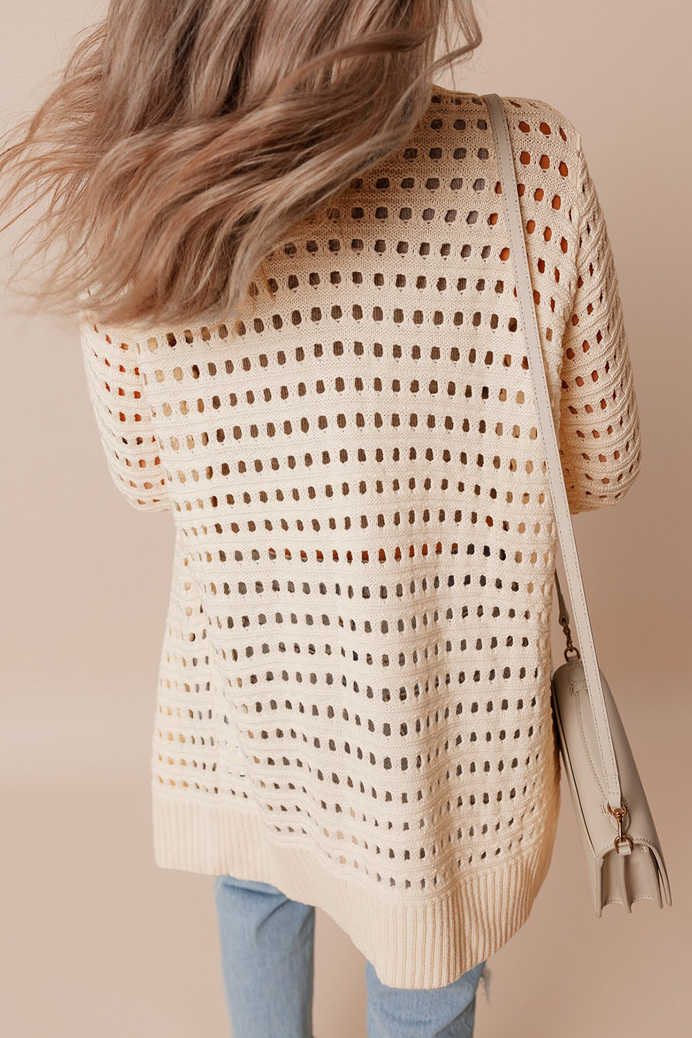 Openwork open front cardigan.