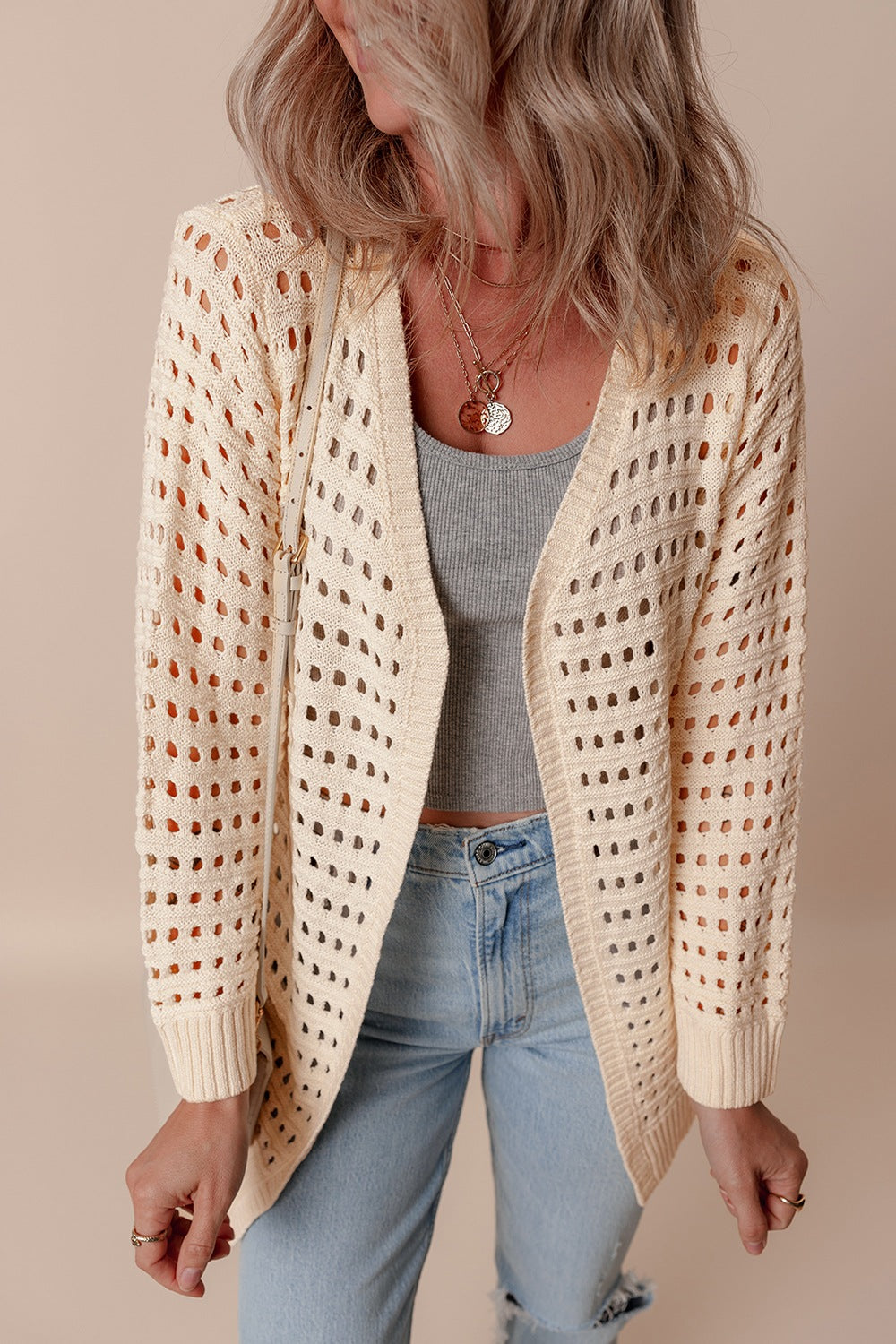 Openwork open front cardigan.
