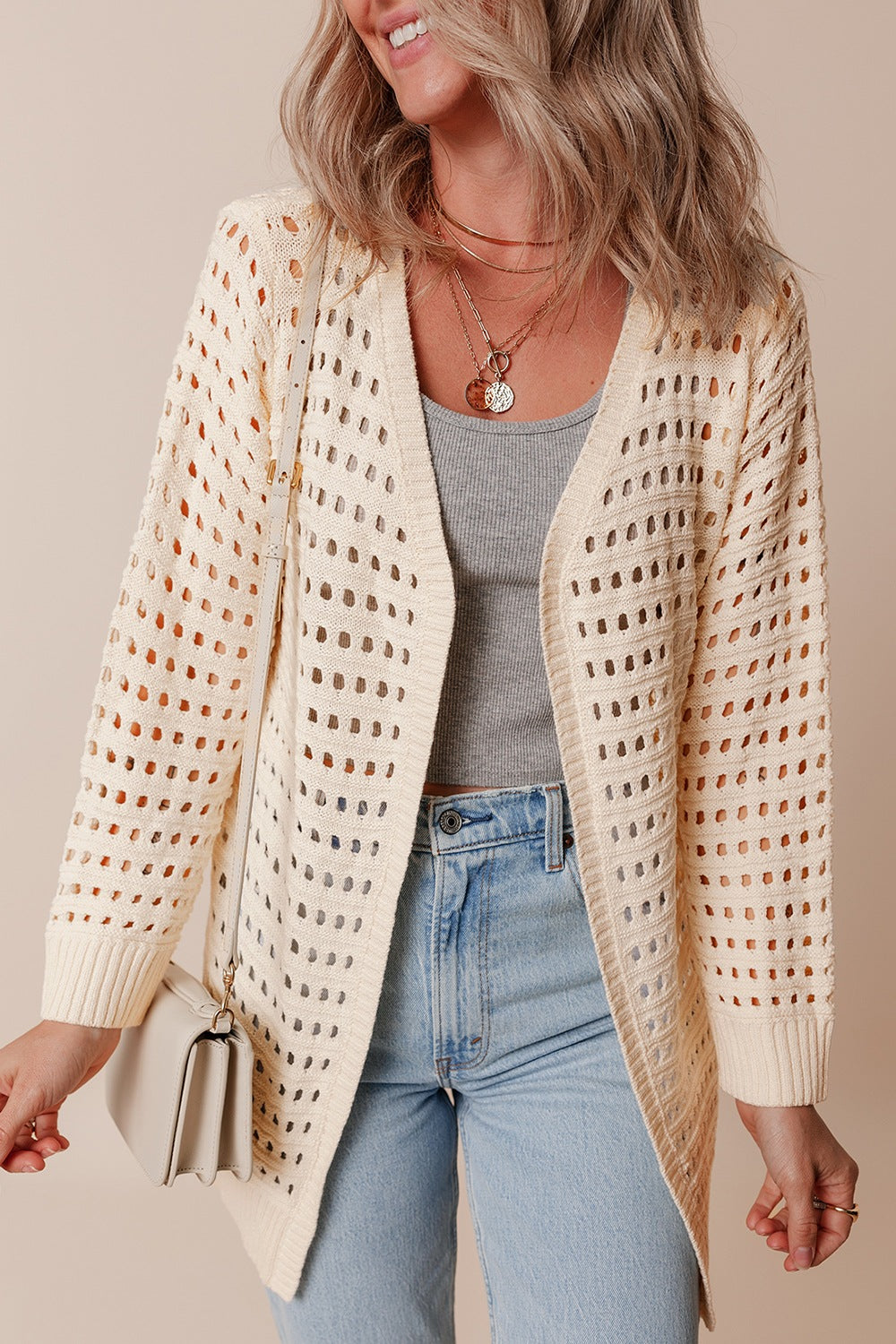 Openwork open front cardigan.