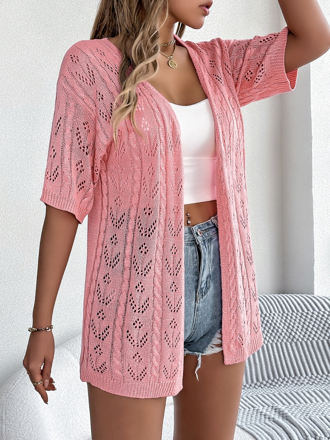 Openwork open front half sleeve cardigan.