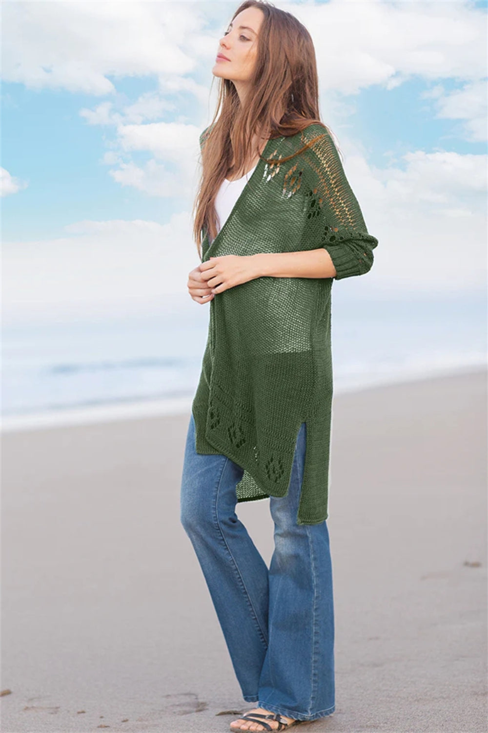 Openwork side slit open front long sleeve cardigan with cutout details.