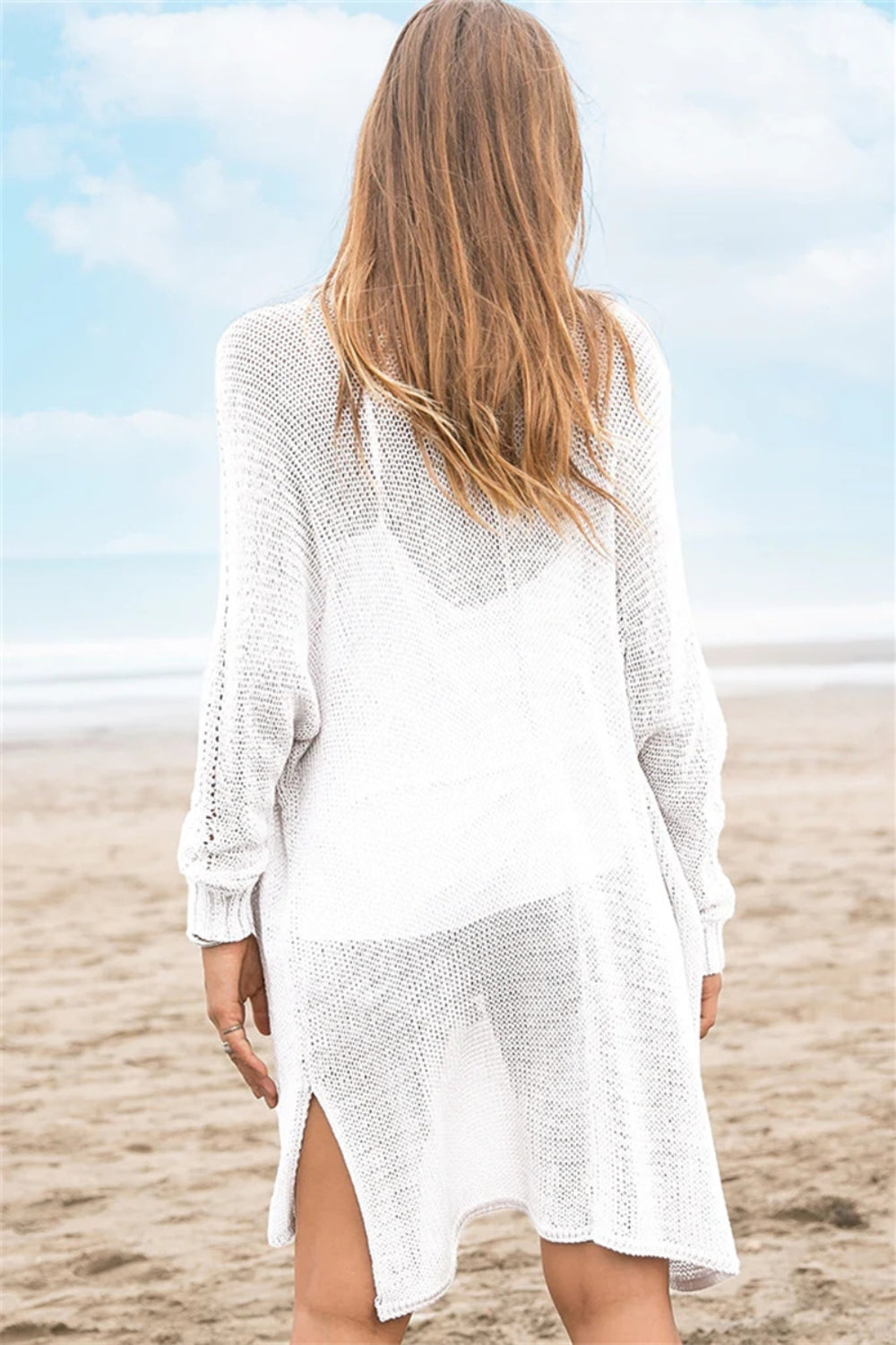 Openwork side slit open front long sleeve cardigan with cutout details.