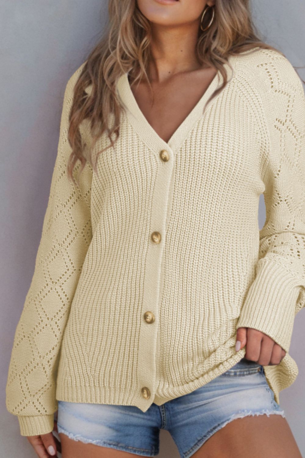 Openwork V-neck button up cardigan.