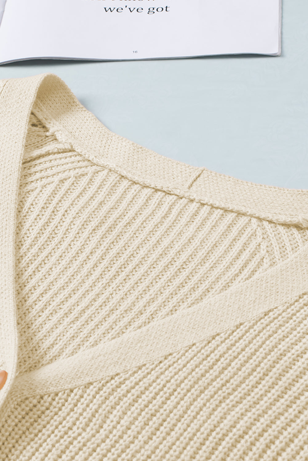 Openwork V-neck button up cardigan.