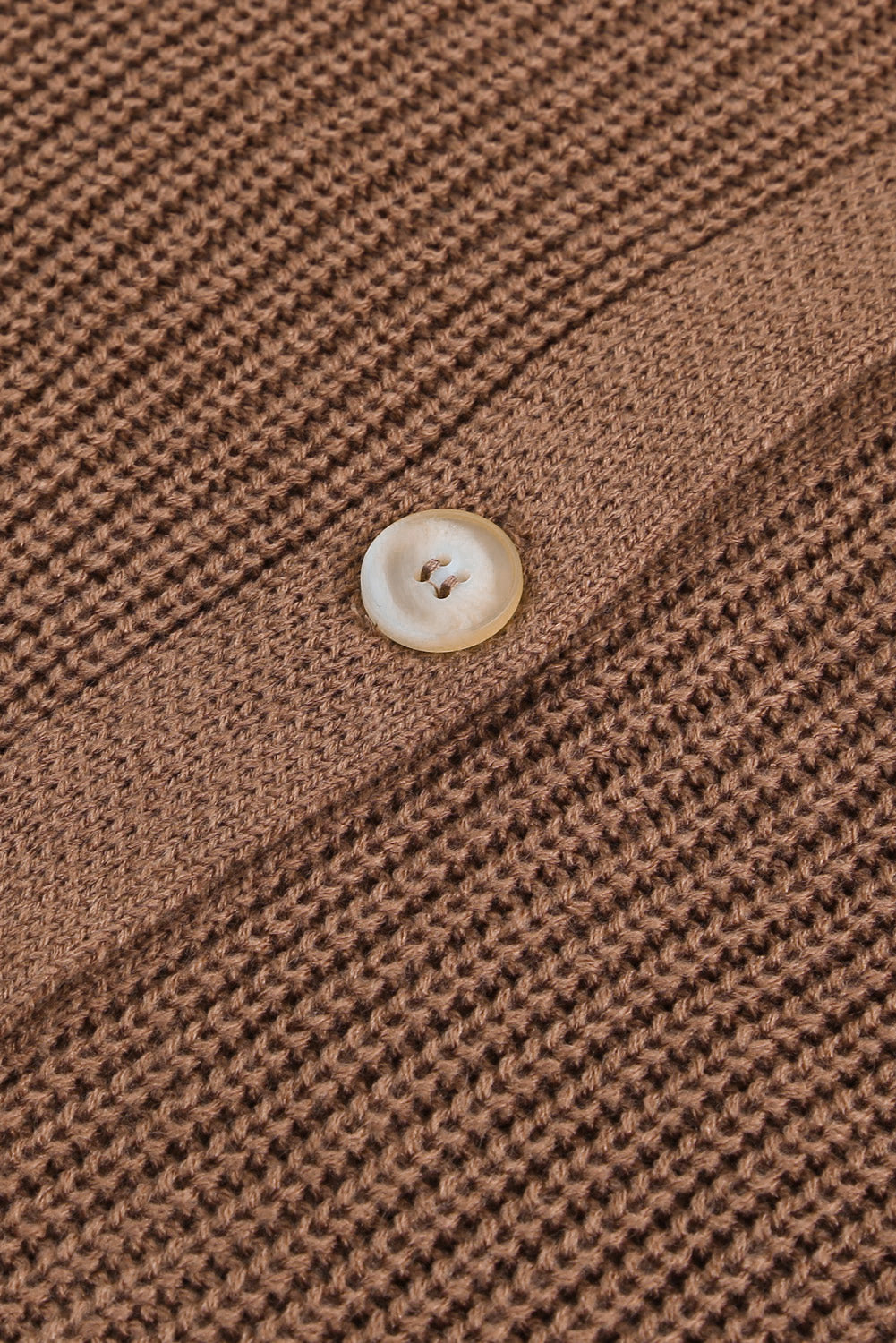 Openwork V-neck button up cardigan.