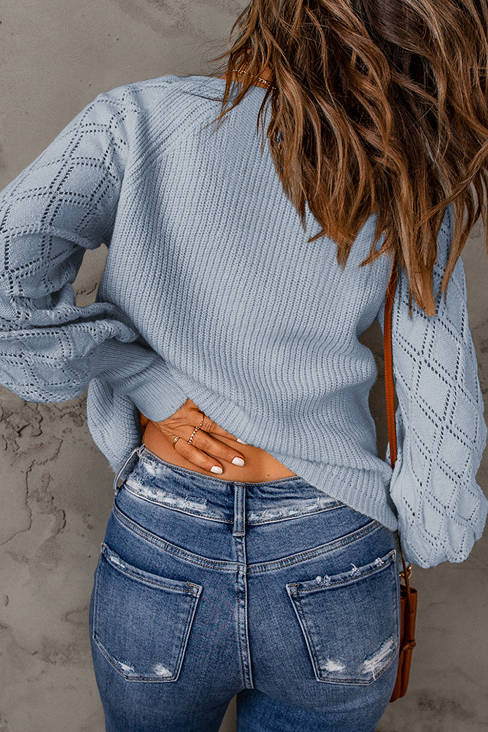 Openwork V-neck button up cardigan.