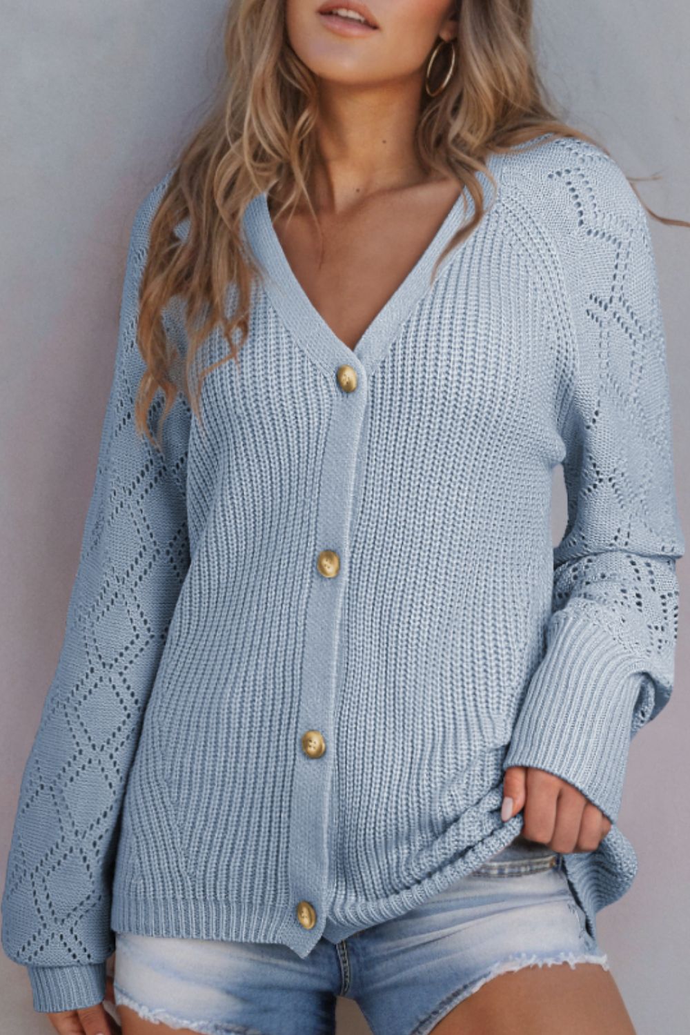 Openwork V-neck button up cardigan.