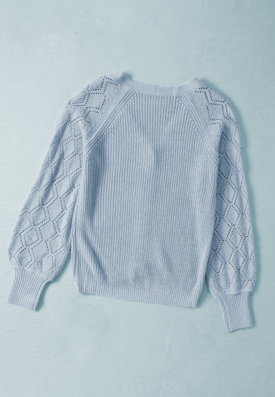 Openwork V-neck button up cardigan.