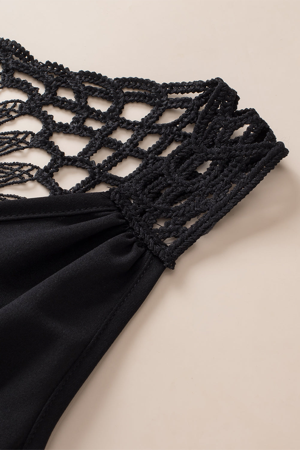 Openwork V-neck tank top.