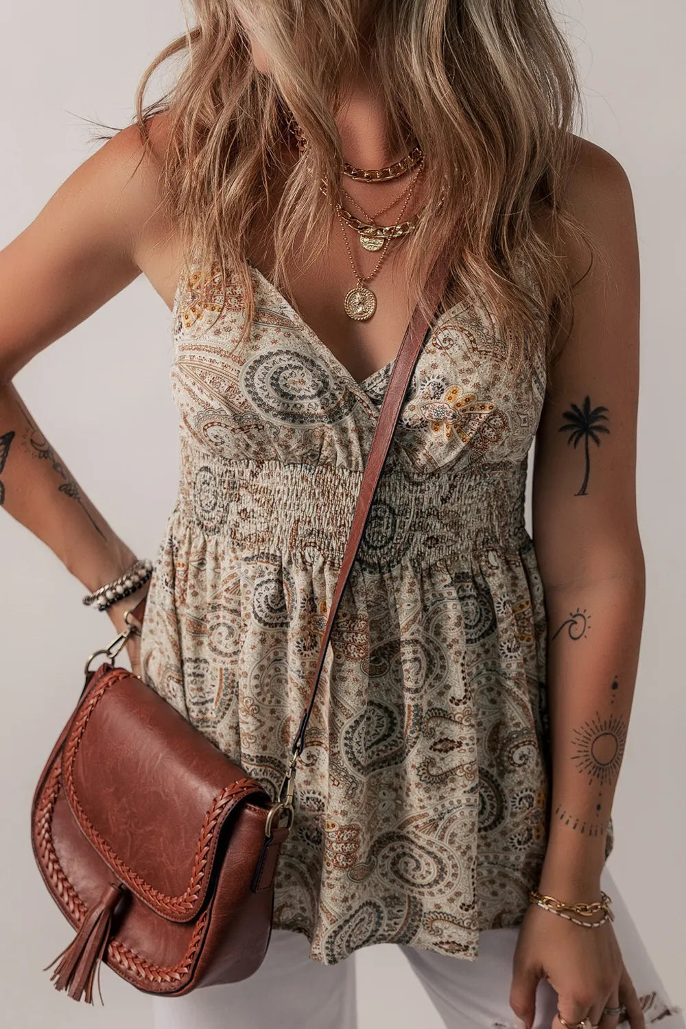 Paisley printed smocked babydoll cami.