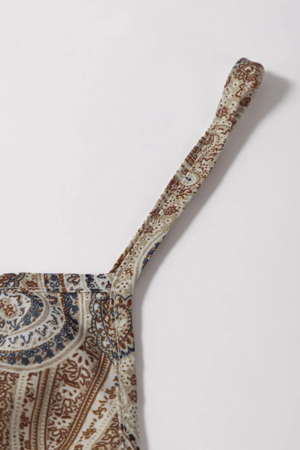 Paisley printed smocked babydoll cami.