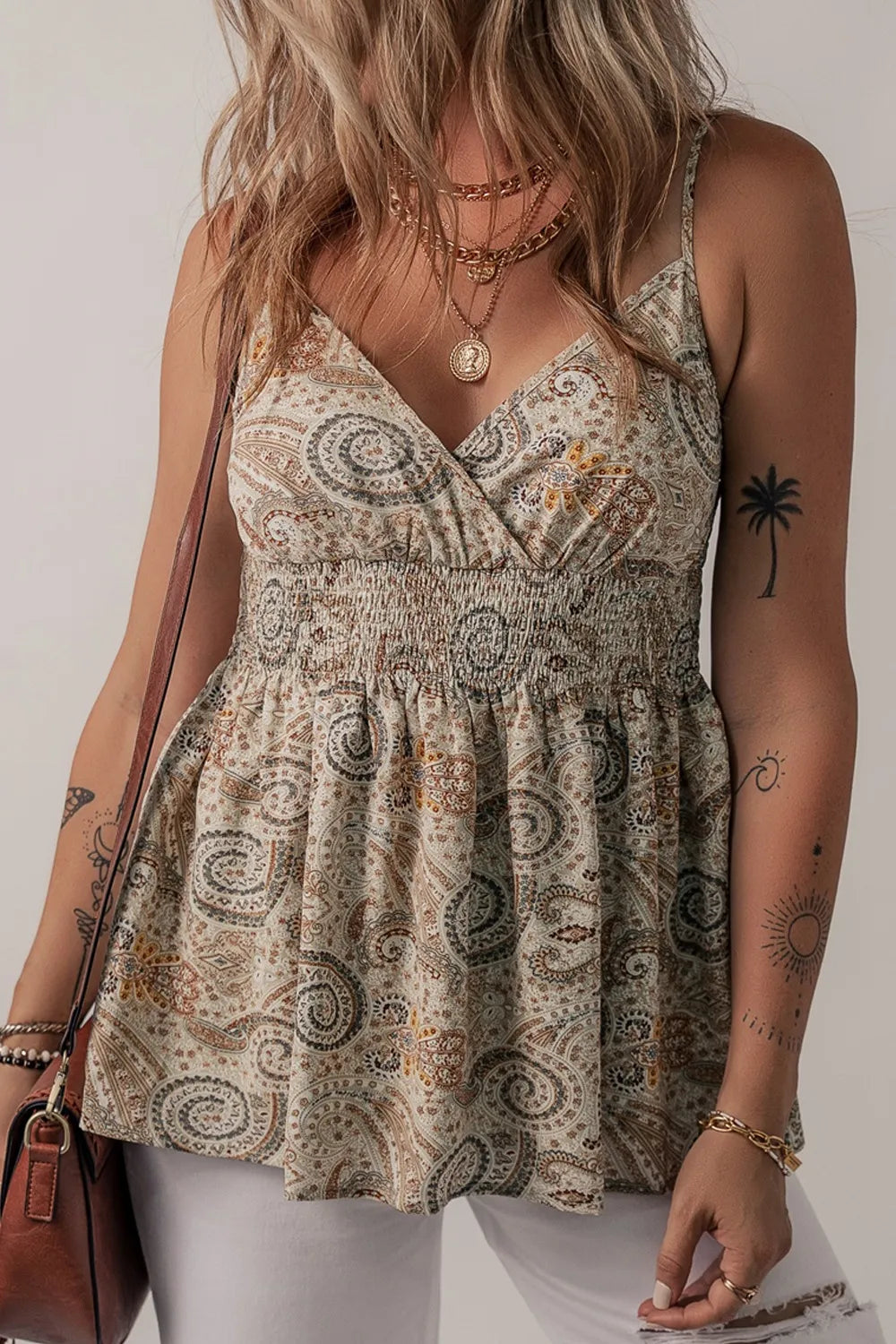 Paisley printed smocked babydoll cami.