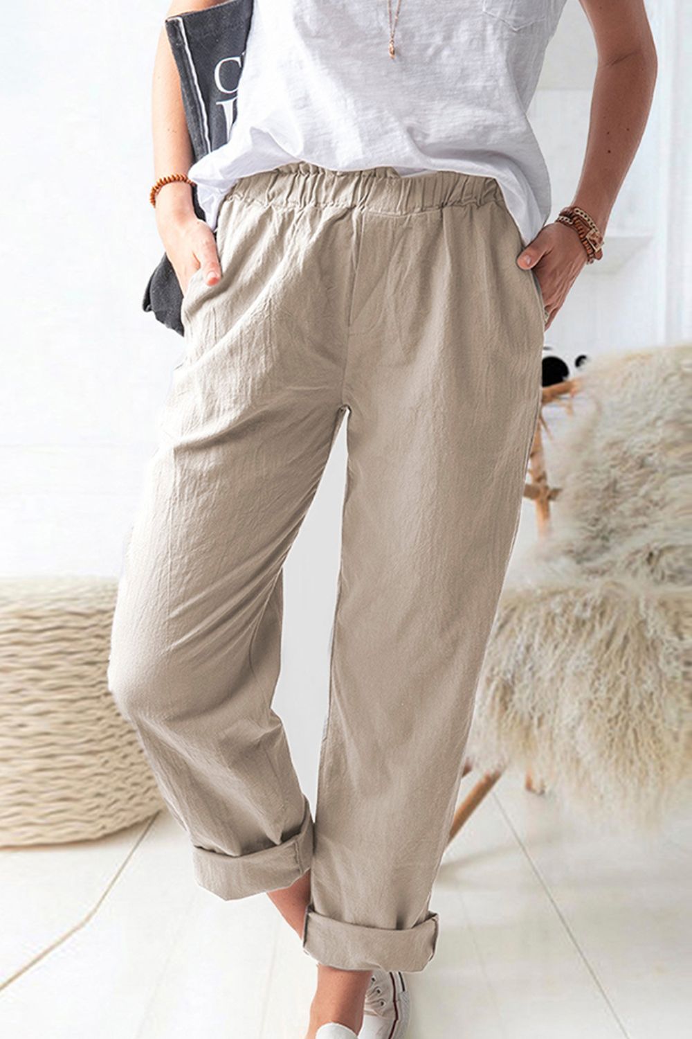 Paperbag waist pull-on pants with pockets, casual chic style.