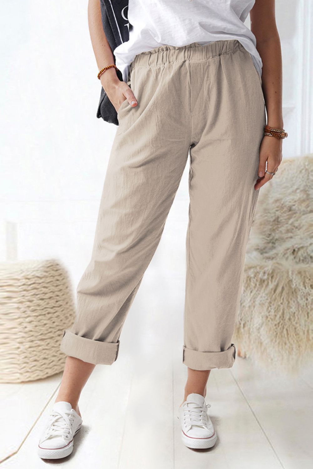 Paperbag waist pull-on pants with pockets, casual chic style.