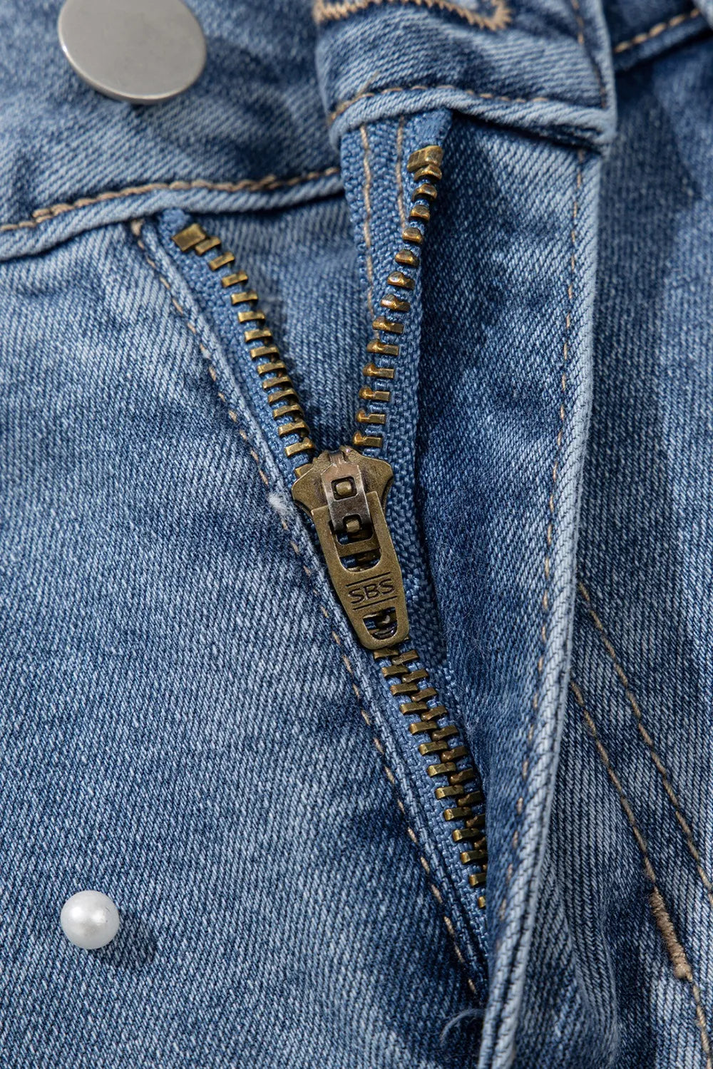 High-waist washed denim shorts with pockets.