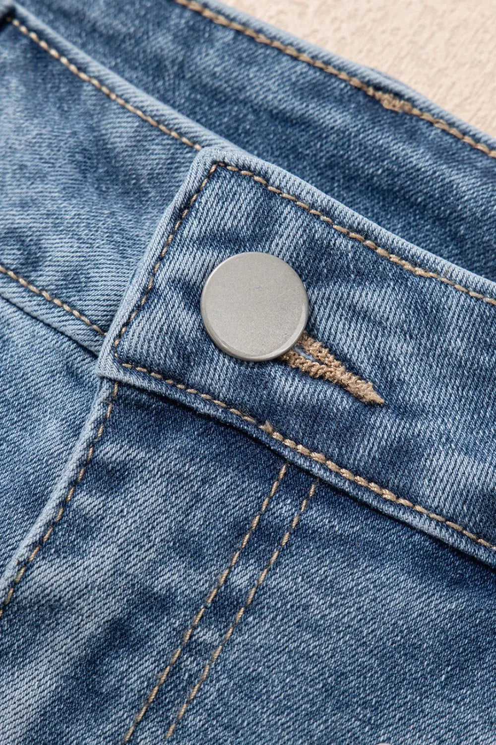 High-waist washed denim shorts with pockets.