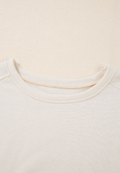 Pearl Detail Round Neck Half Sleeve Blouse.
