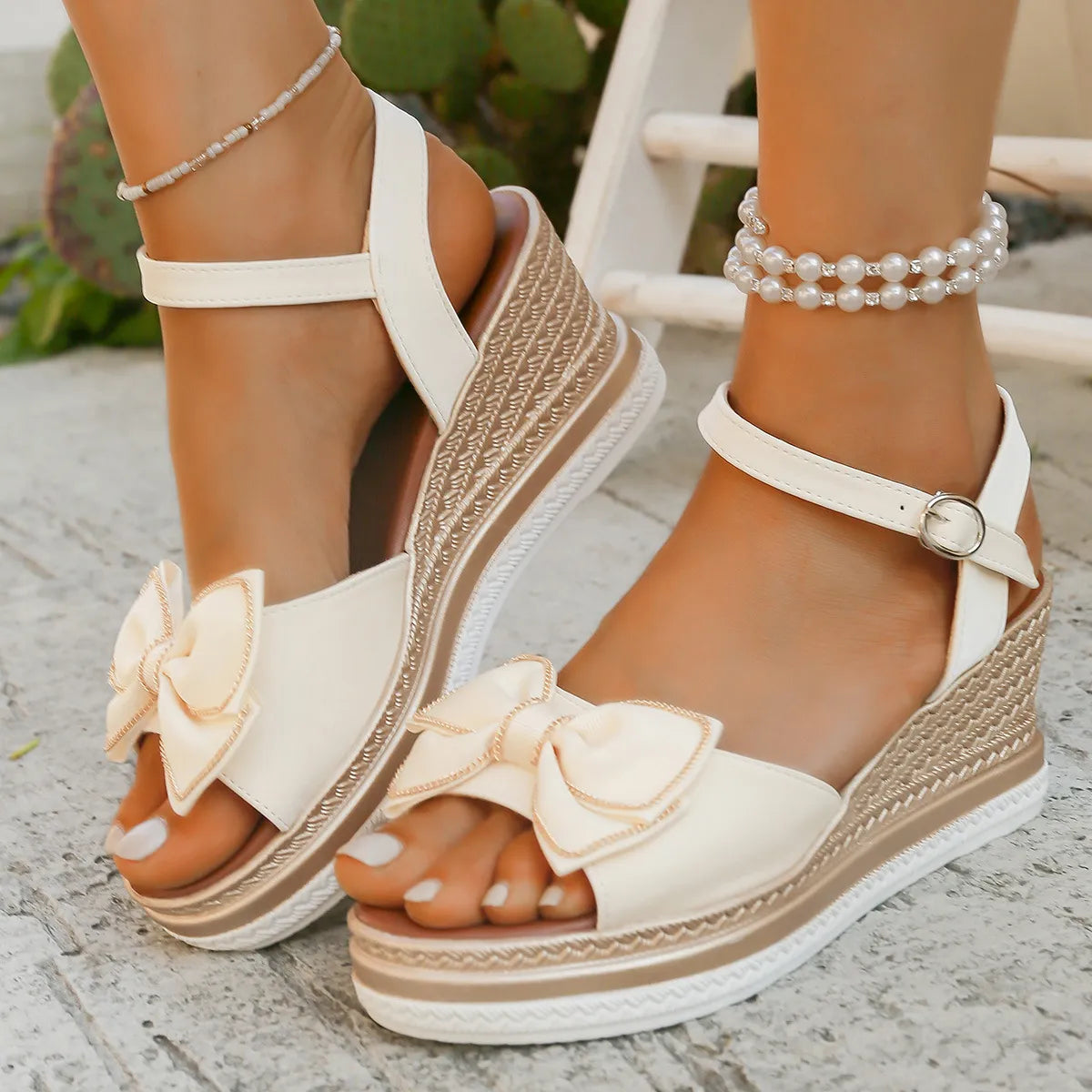 Open toe mid-heel wedge sandals.