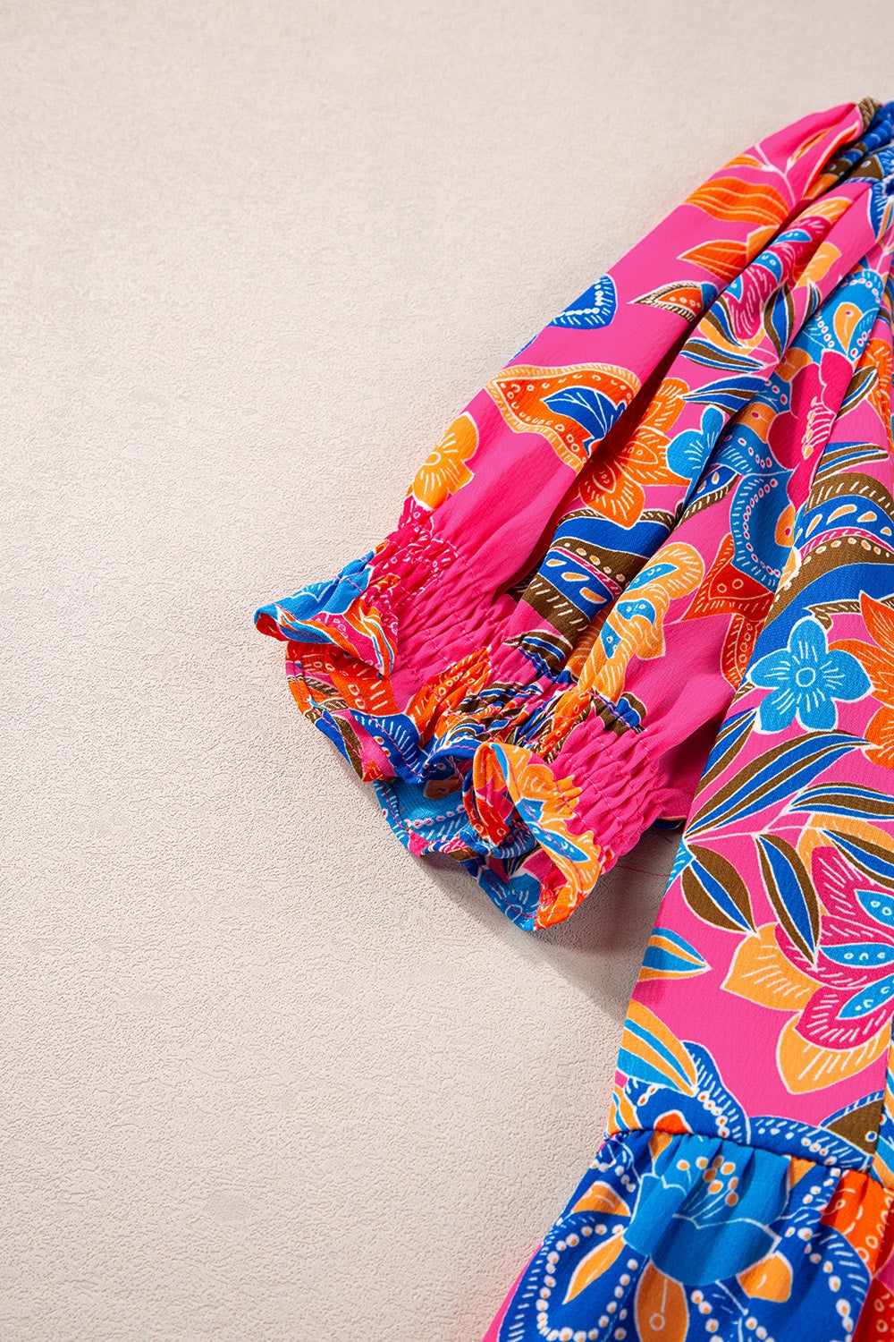 Peplum Printed Notched Short Sleeve Blouse.