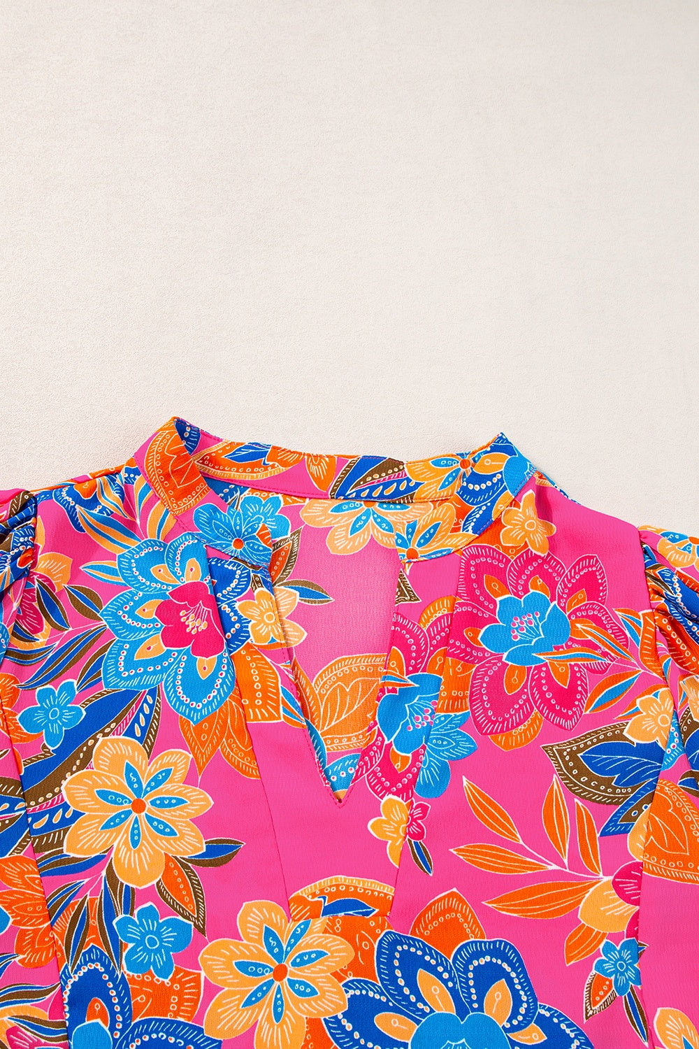 Peplum Printed Notched Short Sleeve Blouse.