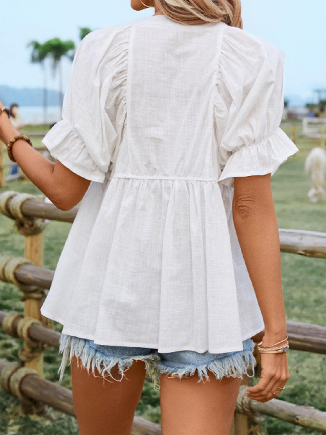 Peplum Round Neck Flounce Sleeve Blouse with Buttoned and Ruffled.