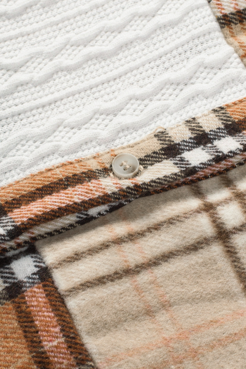 Plaid button up long sleeve shacket with pockets.