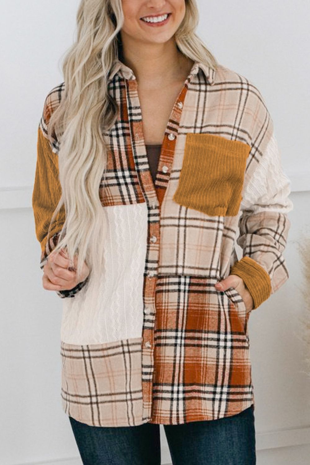 Plaid button up long sleeve shacket with pockets.