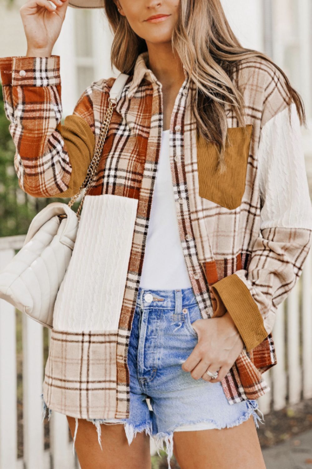 Plaid button up long sleeve shacket with pockets.