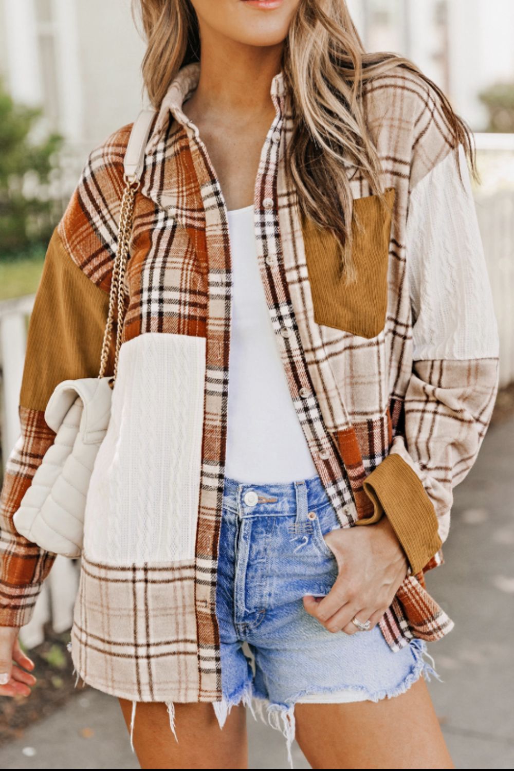 Plaid button up long sleeve shacket with pockets.