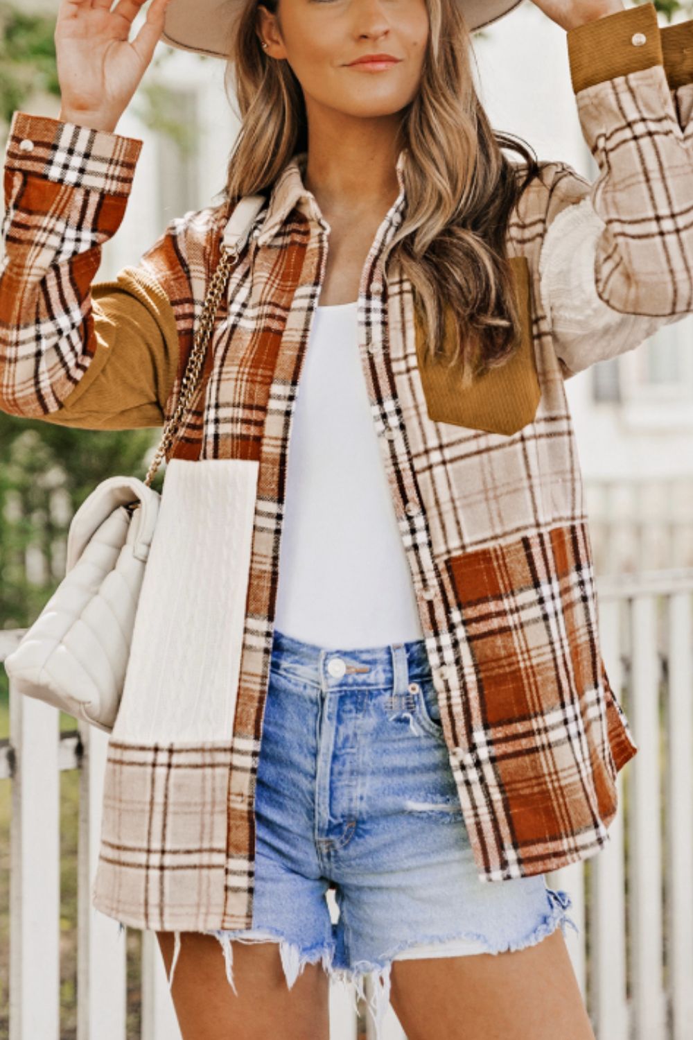 Plaid button up long sleeve shacket with pockets.