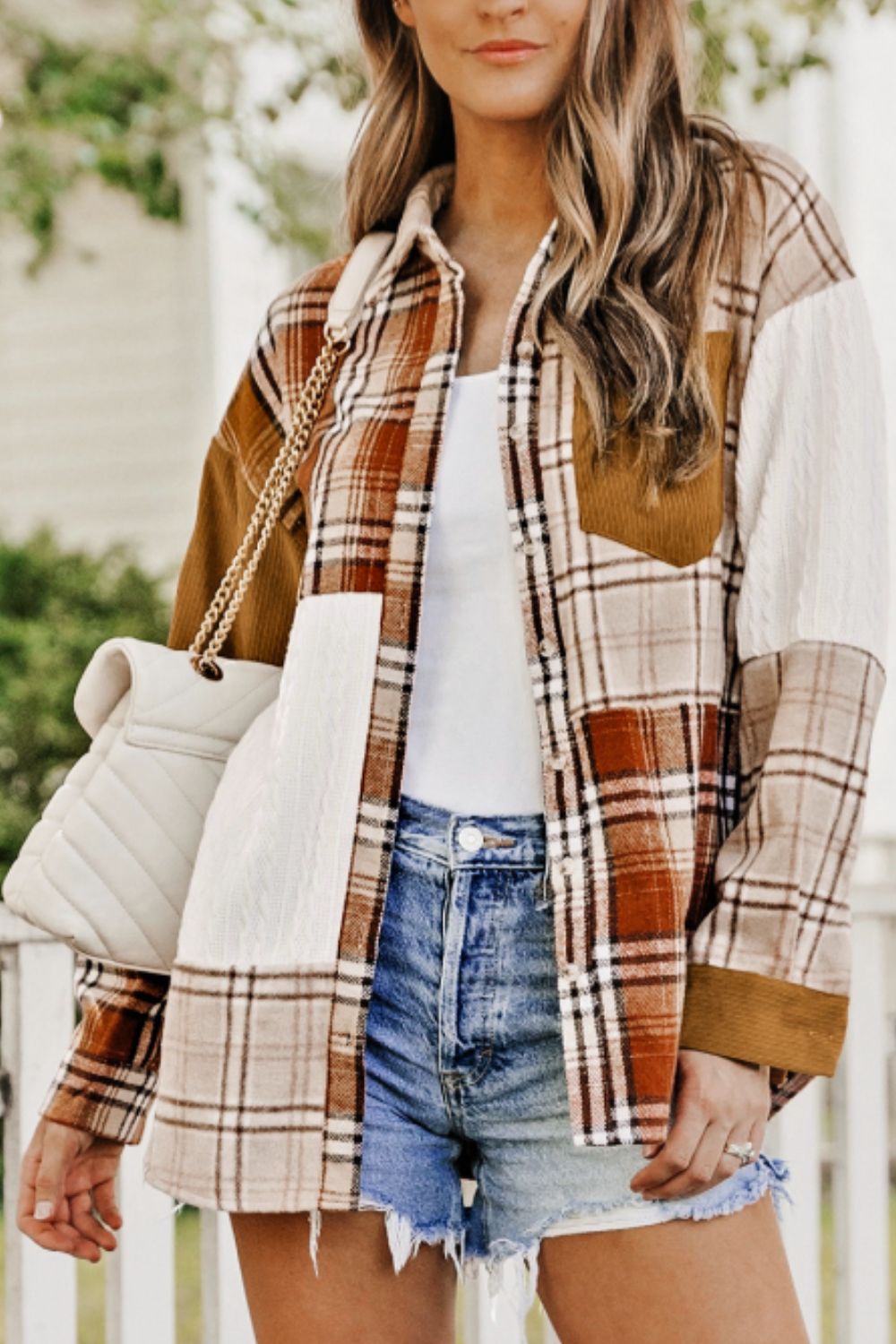 Plaid button up long sleeve shacket with pockets.