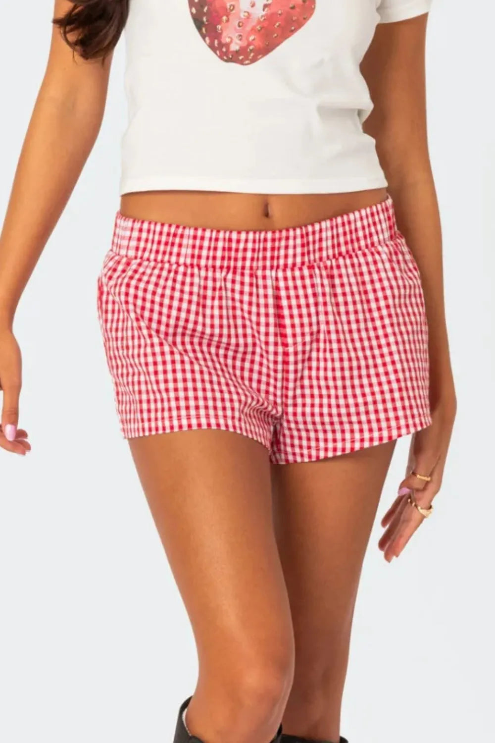 High waist cuff denim shorts with drawstring and pockets.