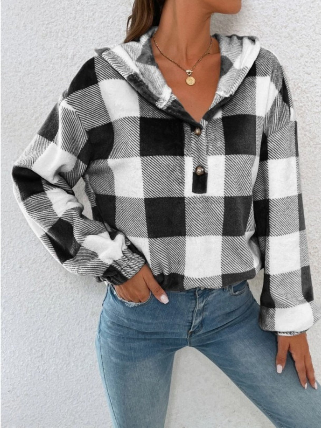Plaid half-button long sleeve hoodie.