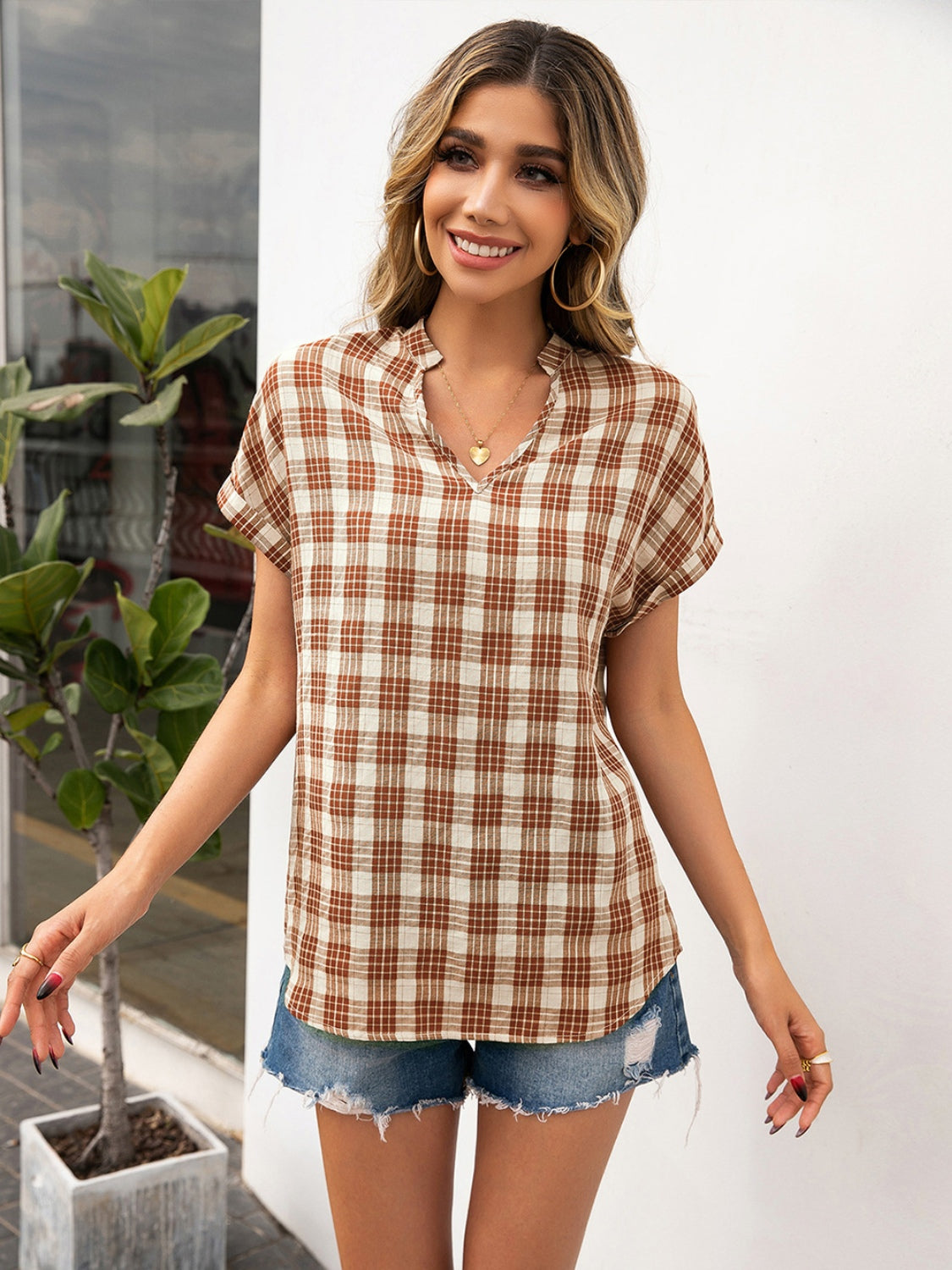 Ivy Lane Plaid Notched Short Sleeve Blouse.