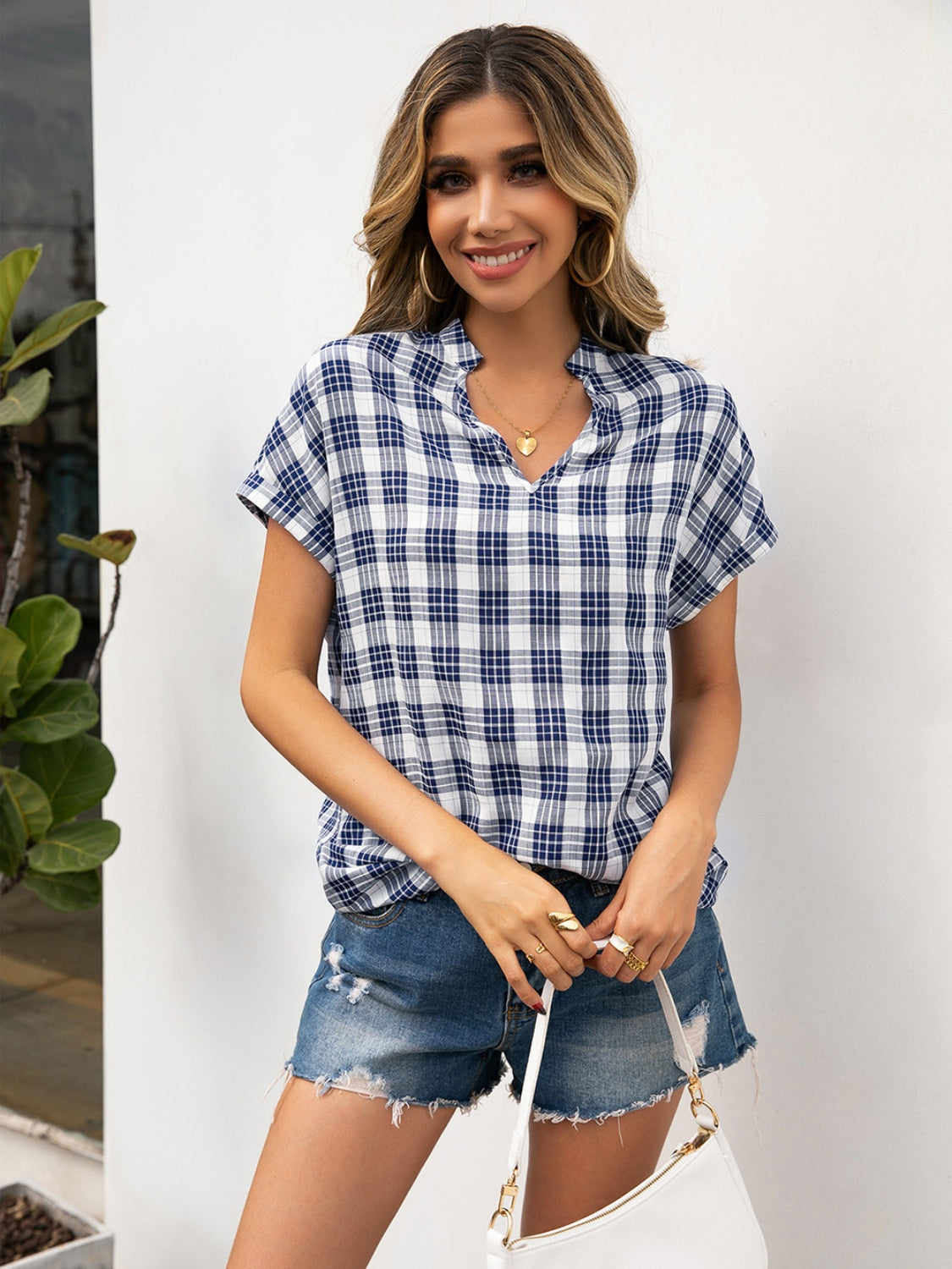 Ivy Lane Plaid Notched Short Sleeve Blouse.